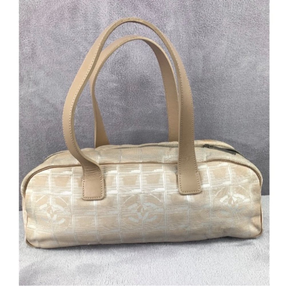 Pre-Owned Authentic CHANEL Travel Line Handbag